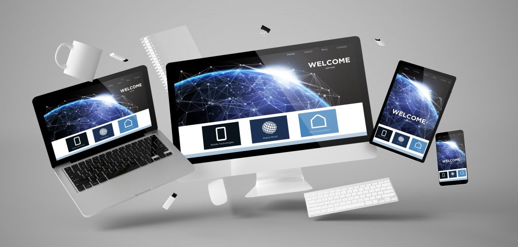 office stuff and devices floating with welcome page website